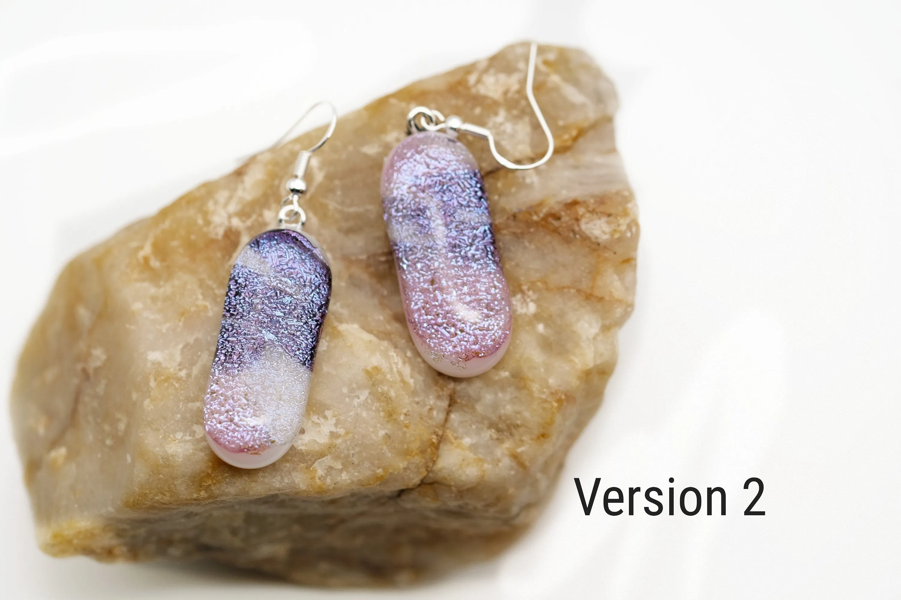 Dichroic pink, purple and white sparkling fused glass pierced dangling earrings on silver french wires. Approx 2 inches total length