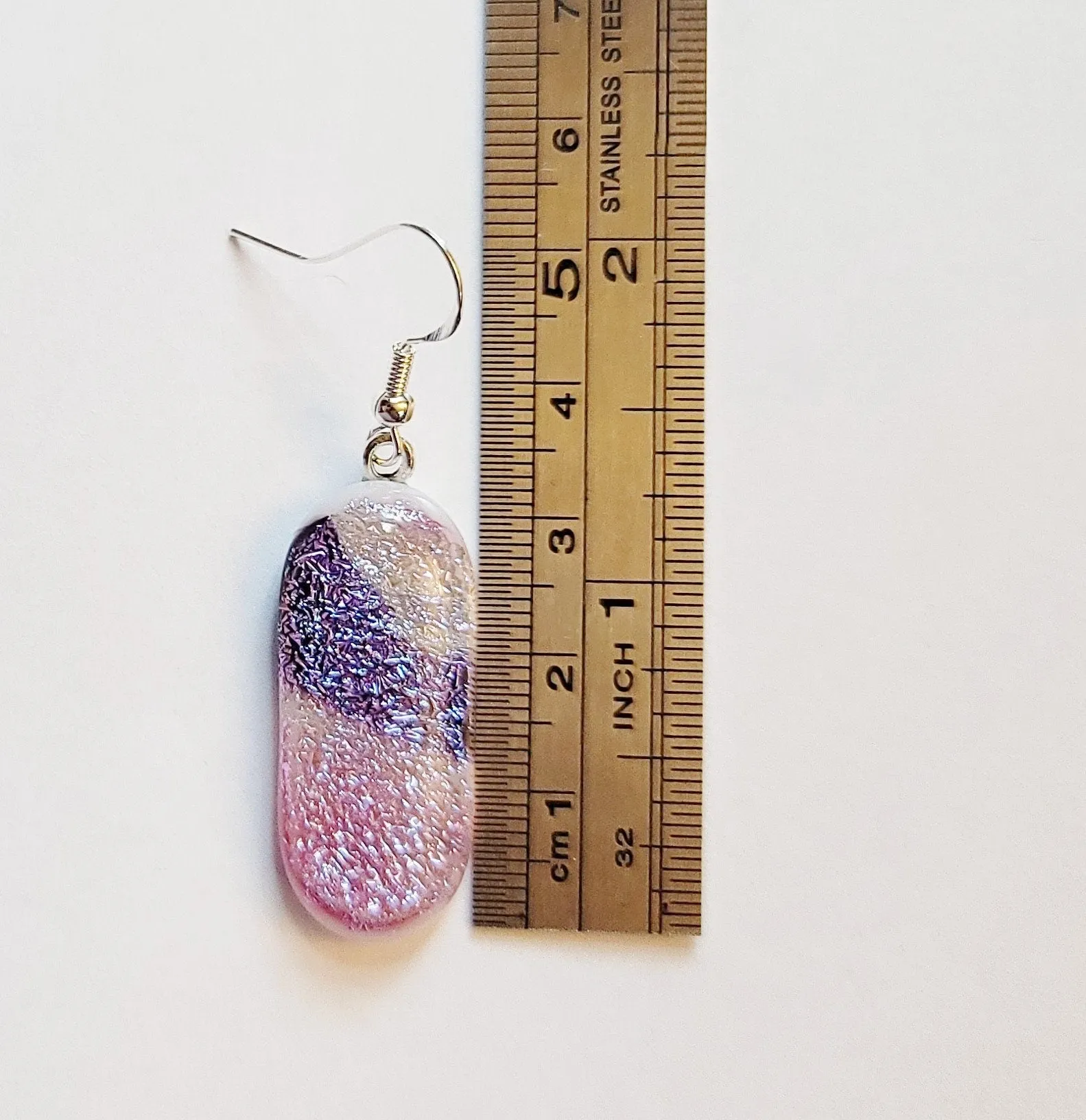Dichroic pink, purple and white sparkling fused glass pierced dangling earrings on silver french wires. Approx 2 inches total length