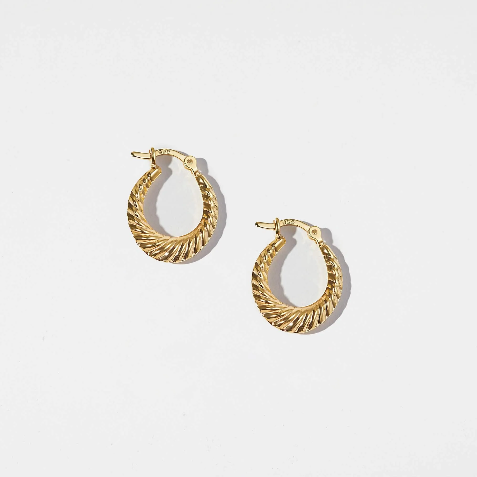 Elegant Twisted Croissant Hoop Earrings in Two-Tone Finish