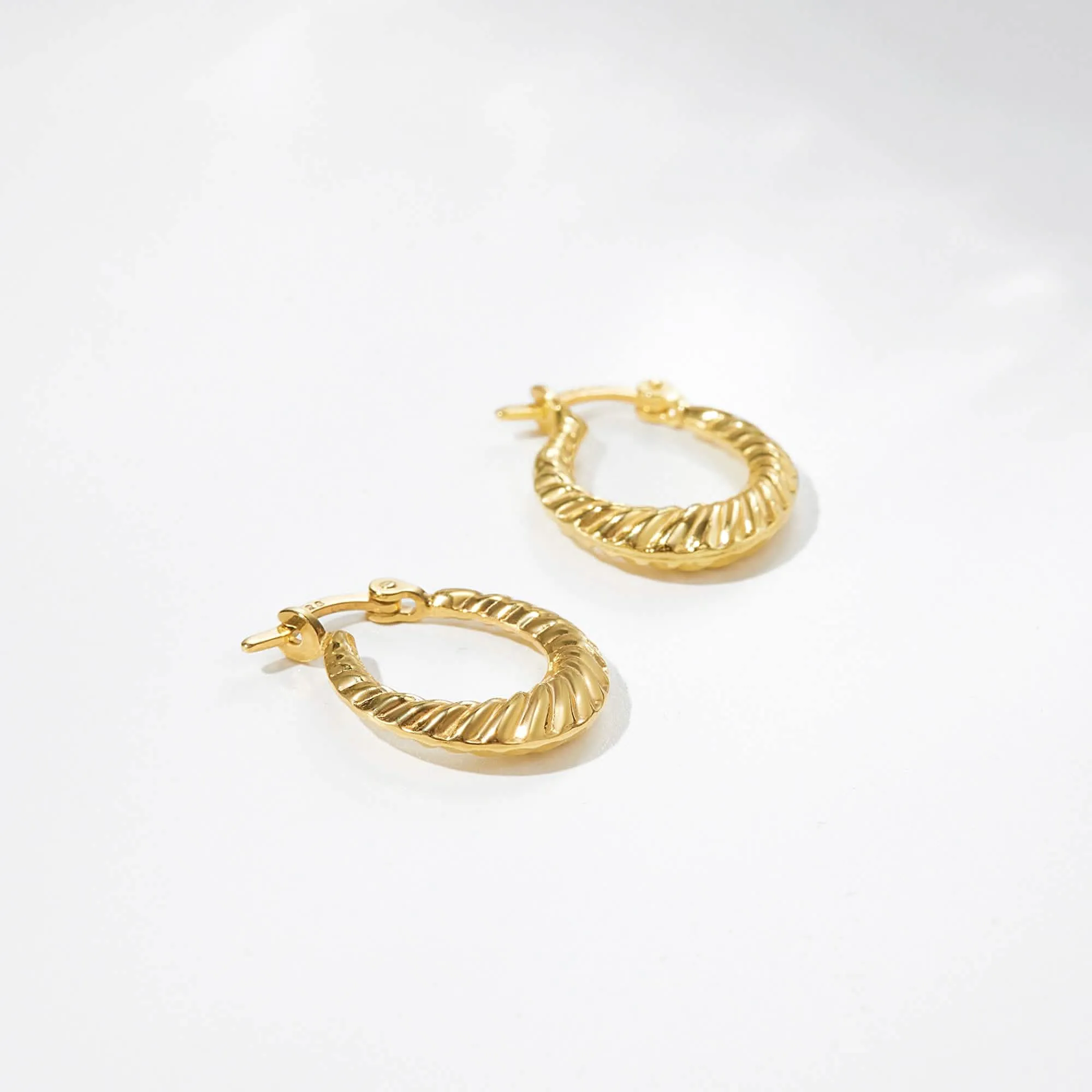 Elegant Twisted Croissant Hoop Earrings in Two-Tone Finish